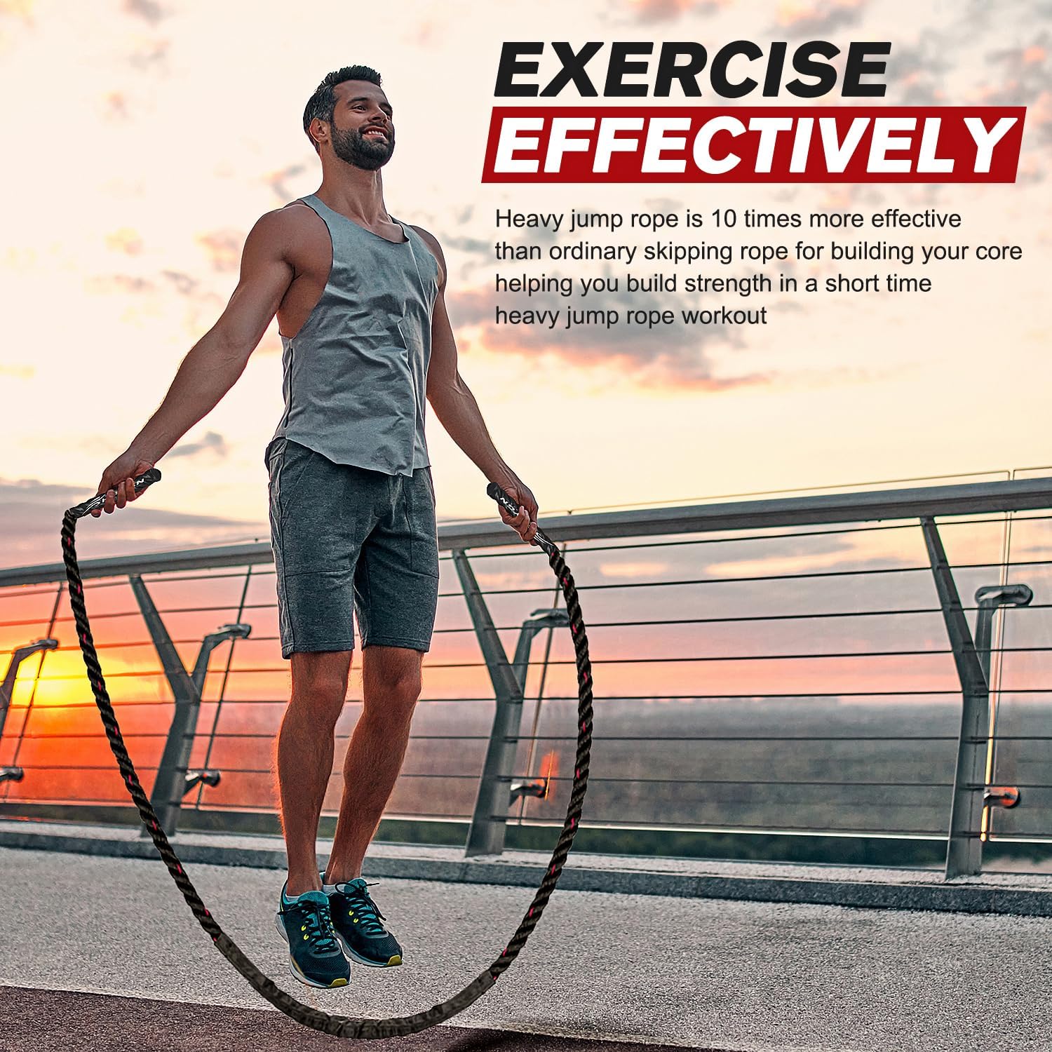 Man jumping rope with Fitlybuy PowerJump, a thick, black weighted skipping rope, during a scenic outdoor sunset.