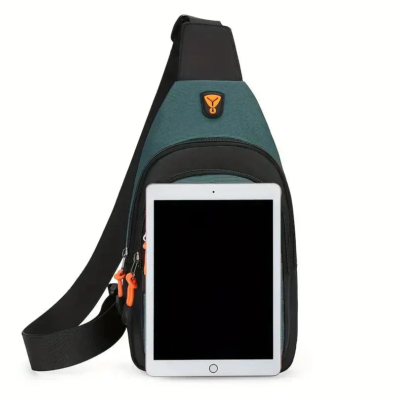 Fitlybuy UrbanTrail teal and black waterproof crossbody shoulder bag with a tablet placed in front.
