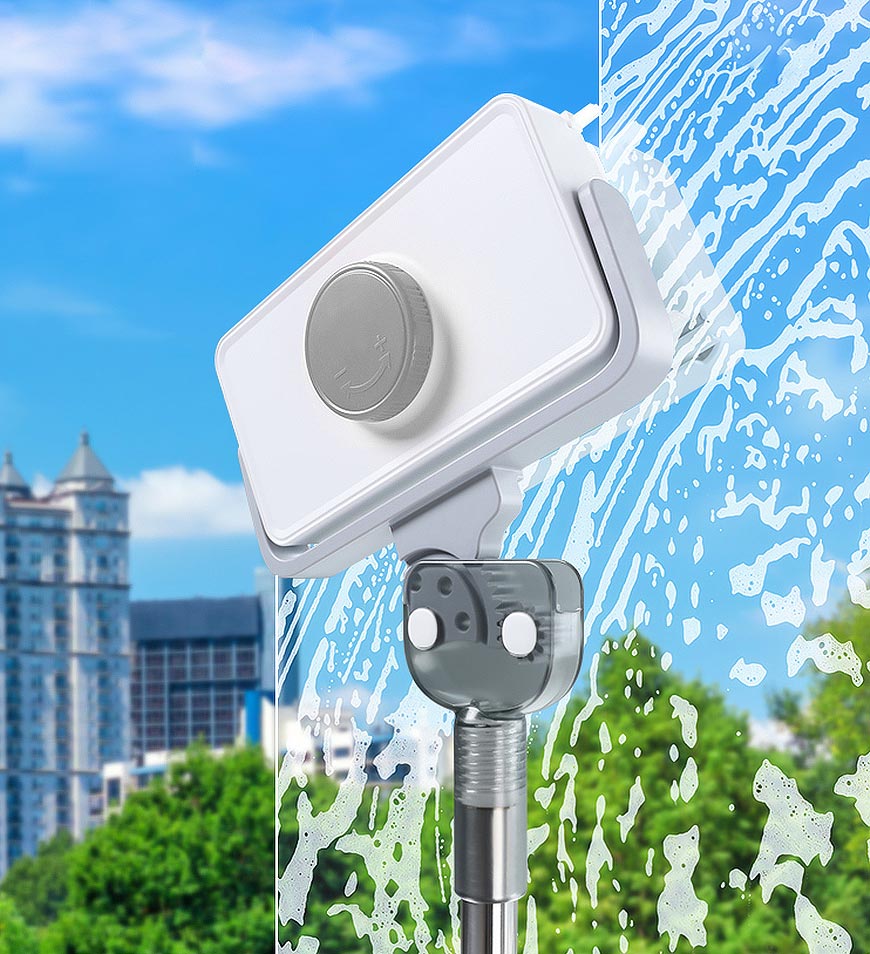 White Fitlybuy magnetic window cleaner with extendable handle cleaning soapy suds off glass with city view background.