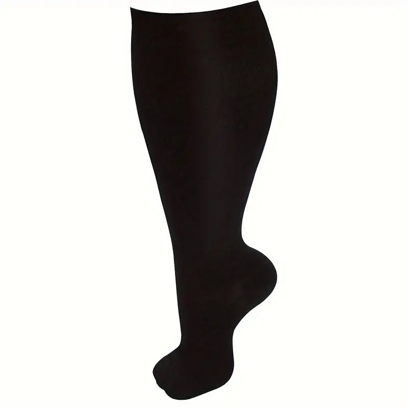 Fitlybuy VitalFlow black plus-size compression sock on a foot form, showing smooth, opaque circulation support fabric.
