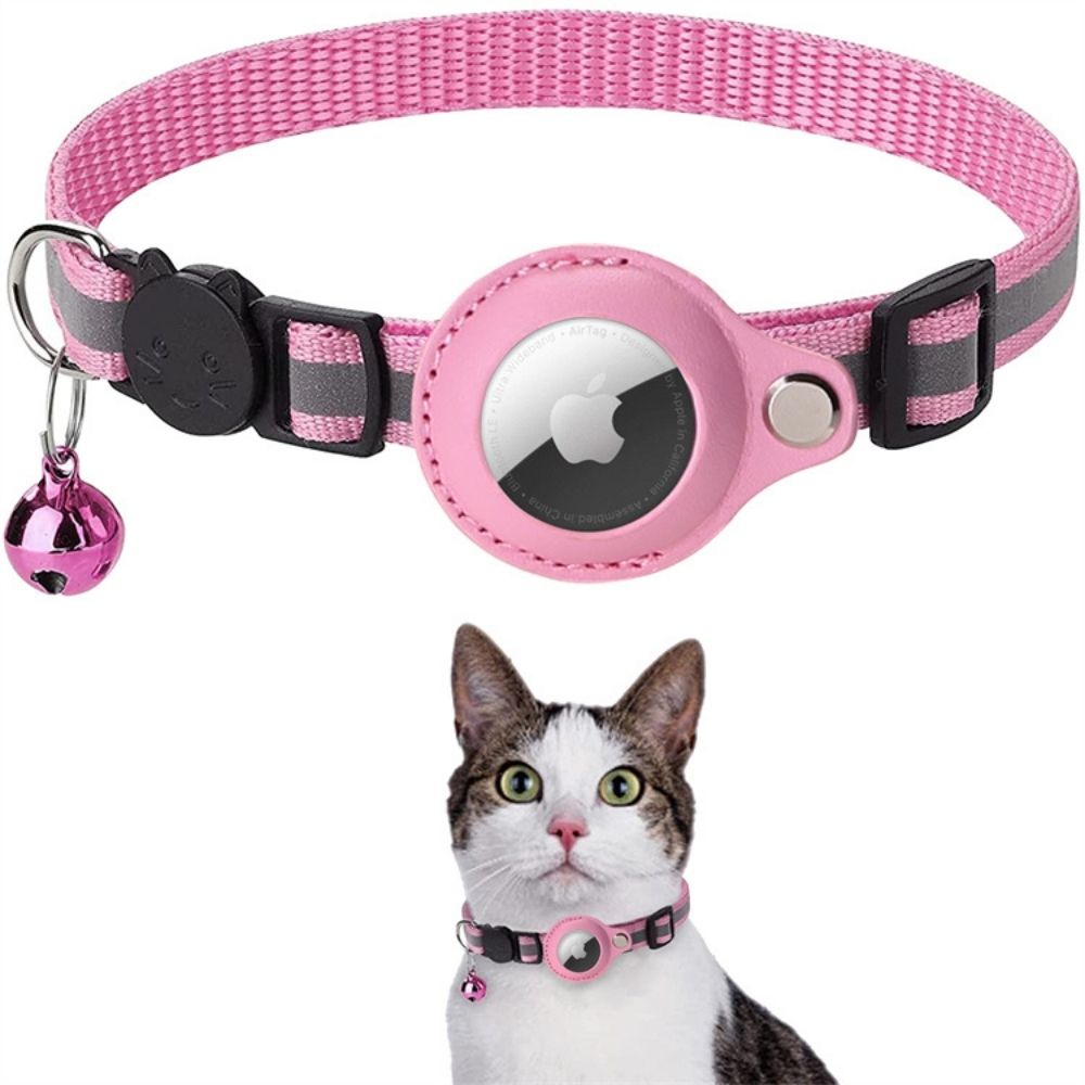 Pink reflective Fitlybuy cat collar with AirTag holder, safety release buckle, and bell, worn by a tabby-white cat.