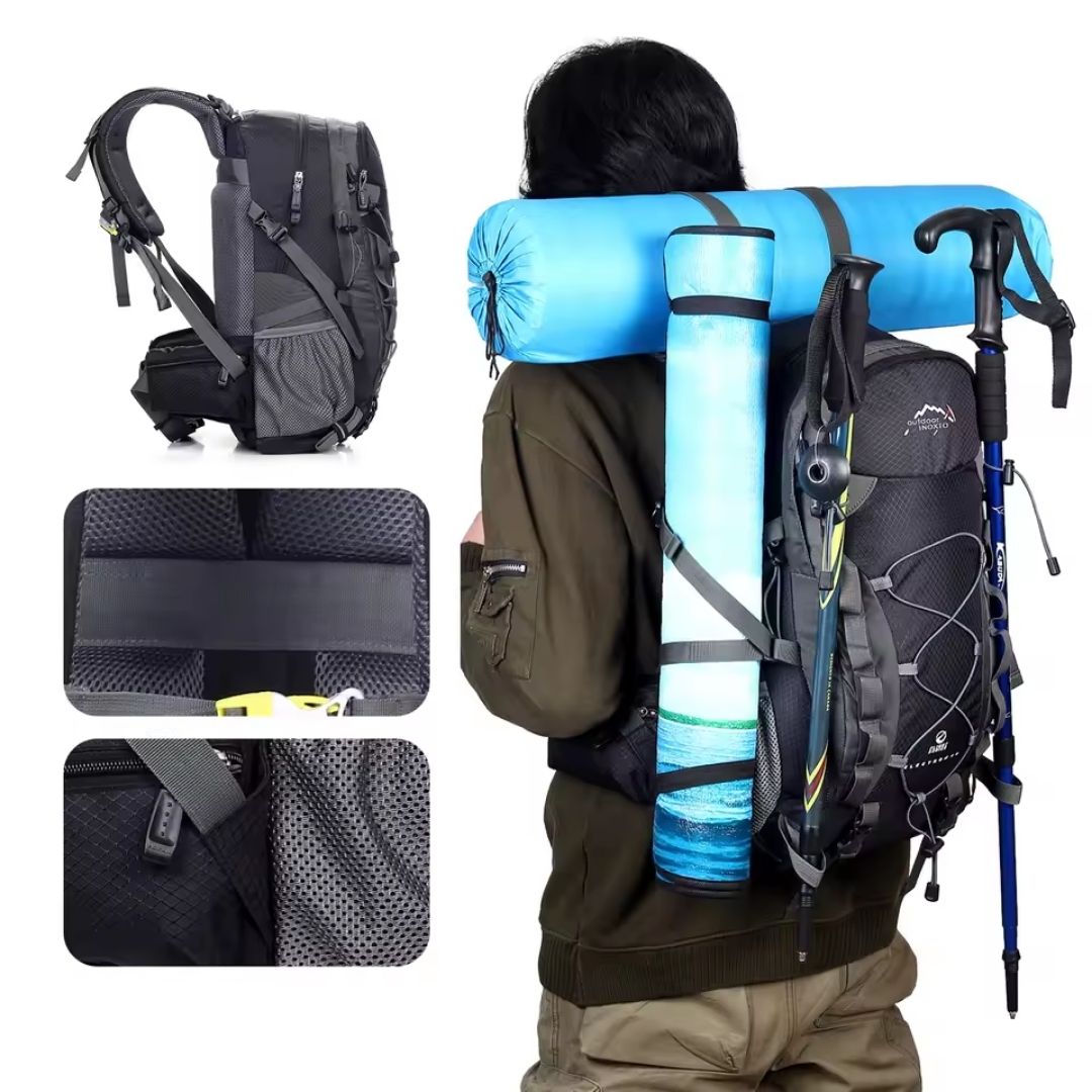 Black Fitlybuy trekking backpack with suspension system, carrying a blue sleeping bag, mat, and hiking poles.