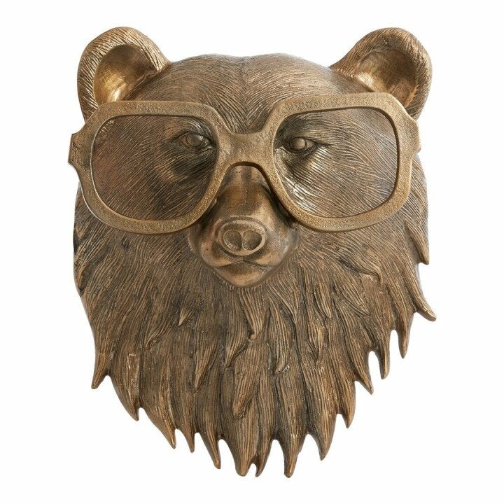 Bronze-colored bear head wall decor wearing stylish glasses, featuring detailed fur texture and a playful design.