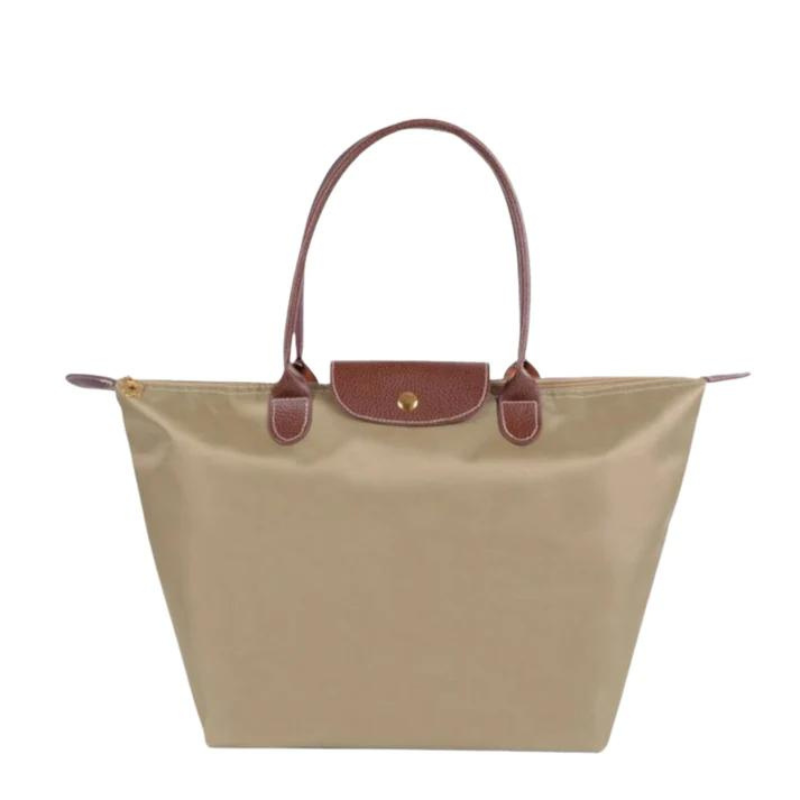 Fitlybuy beige nylon tote bag with brown leather handles and a snap-button flap closure on a plain white background.