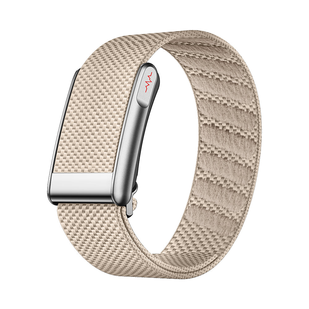 Fitlybuy Kexi-Life beige smart health bracelet with silver casing and red ECG icon on a fabric band.
