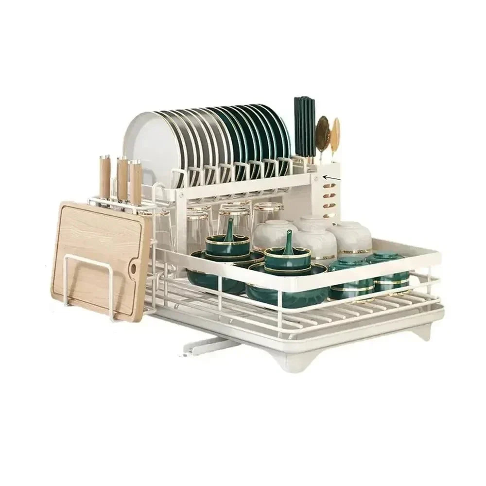 White adjustable dish drying rack with utensil, cutting board, and plate storage, holding various kitchenware items.