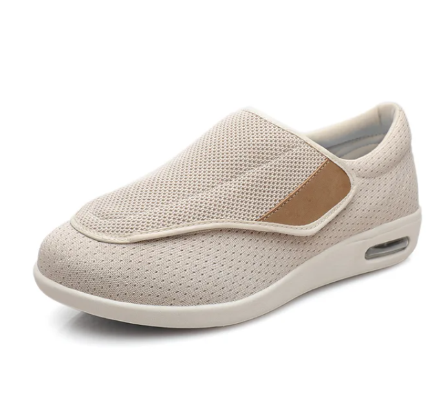 Beige Fitlybuy orthopedic walking shoe with mesh upper, velcro closure, and cushioned sole with air-cushion heel.