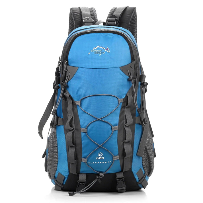 Blue Fitlybuy Pro trekking backpack with hanging system, adjustable straps, and mesh side pockets on a white background.