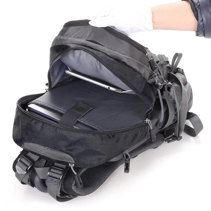 Open Fitlybuy Pro outdoor trekking backpack, black with grey mesh, showing laptop and tablet compartments.