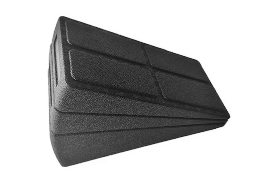 Black adjustable slant board for calf stretching with a textured, ergonomic design against a white background.