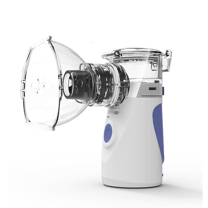 White and blue handheld portable nebulizer with a transparent mask, power button, and medication chamber.