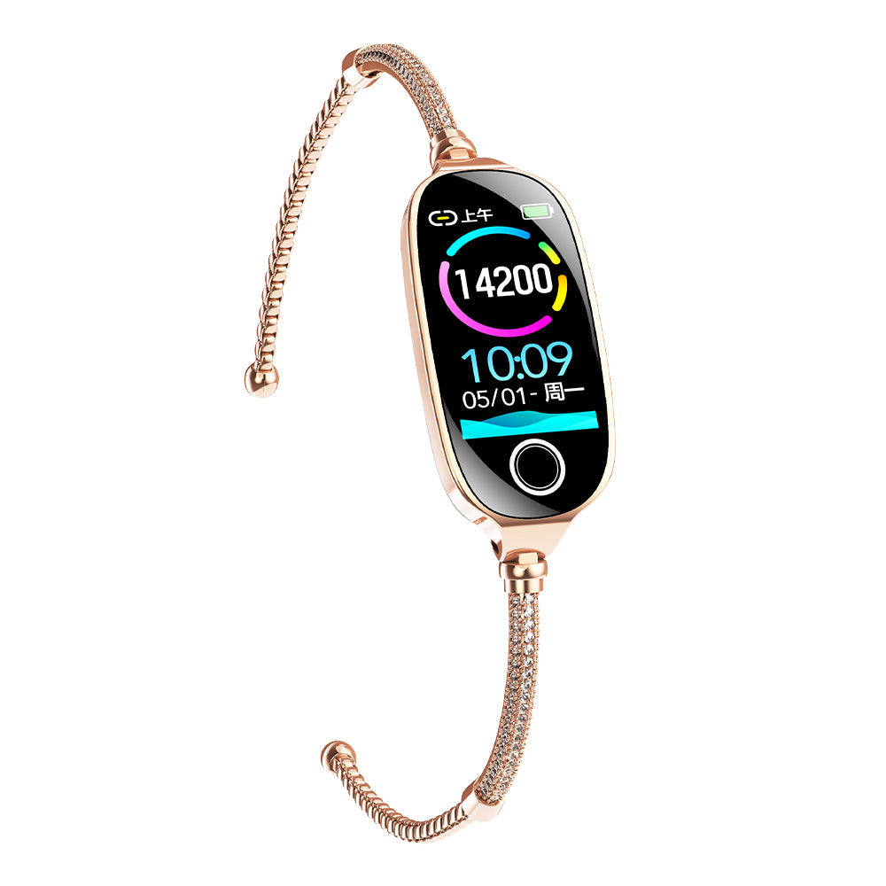 Rose gold Fitlybuy Kexi-Life smartwatch with a diamond-studded bracelet band and digital health tracking display.