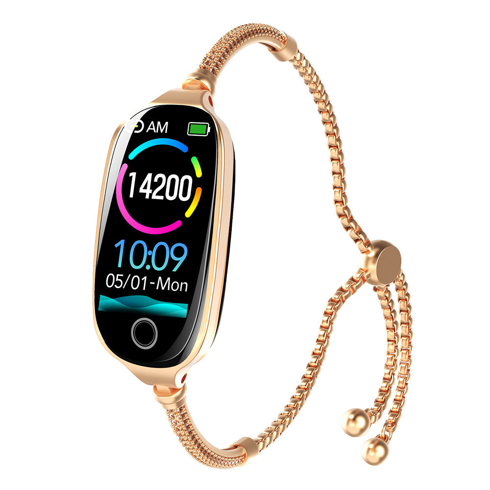 Rose gold luxury smartwatch with an oval digital screen, health tracking display, and a decorative link bracelet strap.