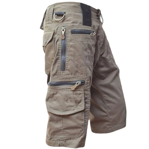 Fitlybuy brown men’s quick-dry cargo shorts featuring multiple zipper pockets, a D-ring, and utility-focused design.