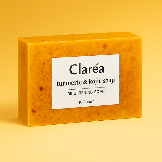 A 100g bar of orange Clareá turmeric and kojic acid brightening soap against a matching yellow background.