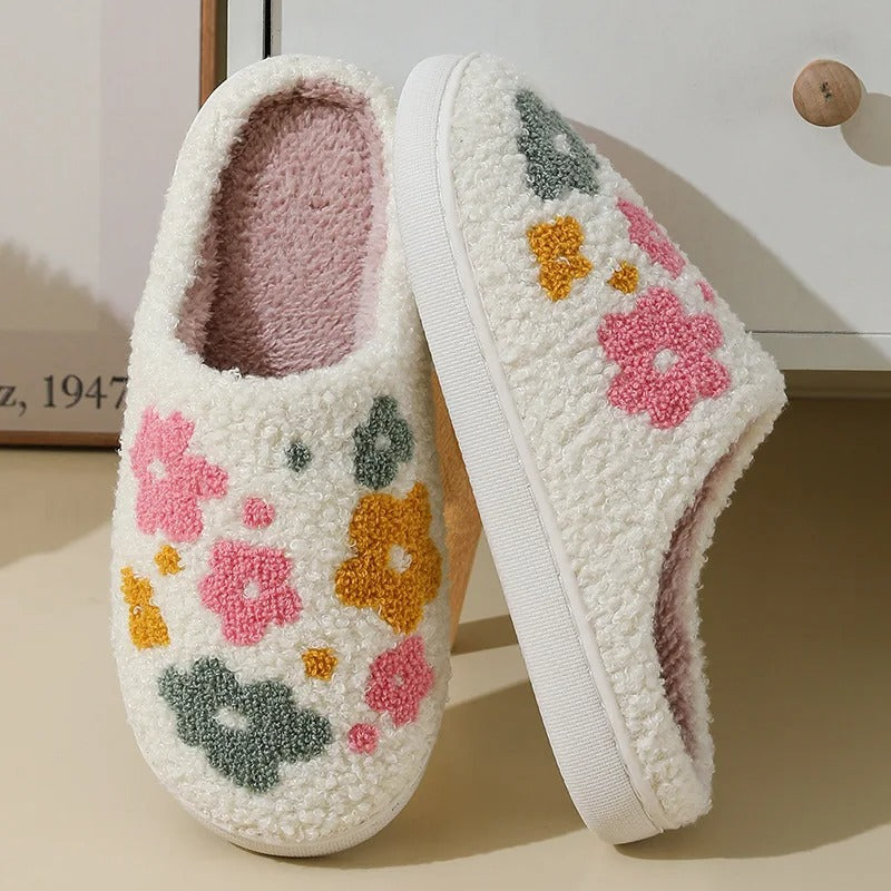 Fitlybuy Nordic Comfort slippers: off-white sherpa with floral patterns, pink lining, and memory foam cushioning.