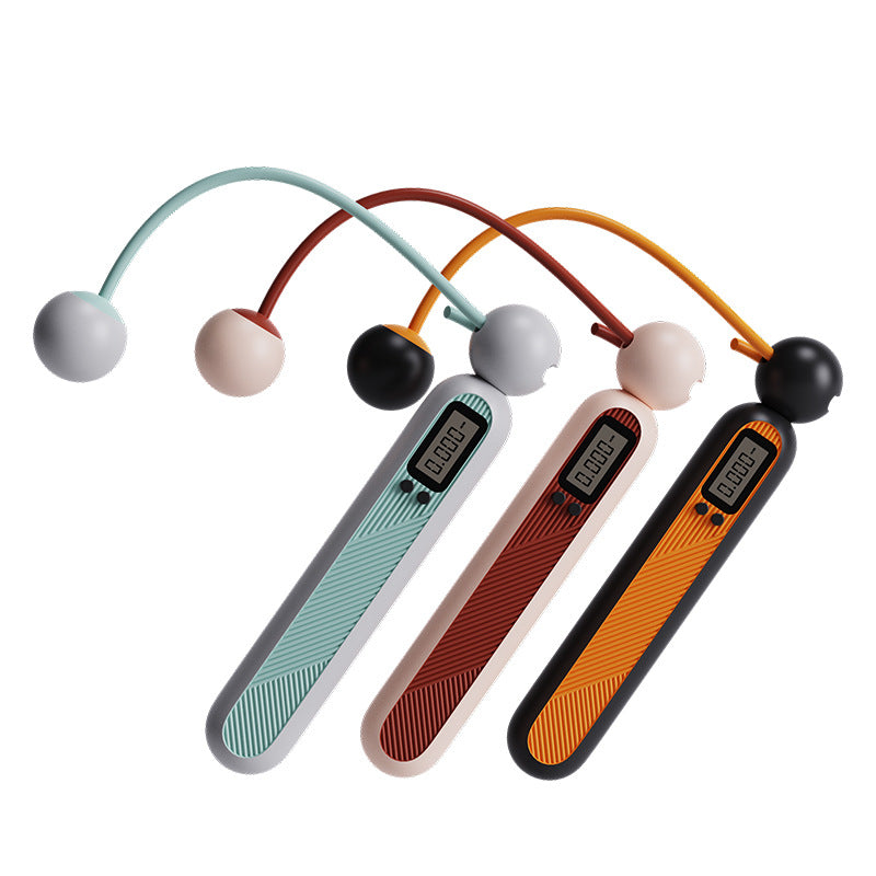 Three Fitlybuy cordless digital jump ropes in teal, red, and black, each featuring an LCD fitness tracking screen.