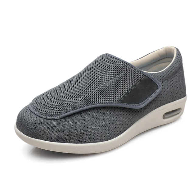Fitlybuy ComfortStride gray orthopedic walking shoe with breathable mesh, velcro closure, and cushioned air-sole heel.
