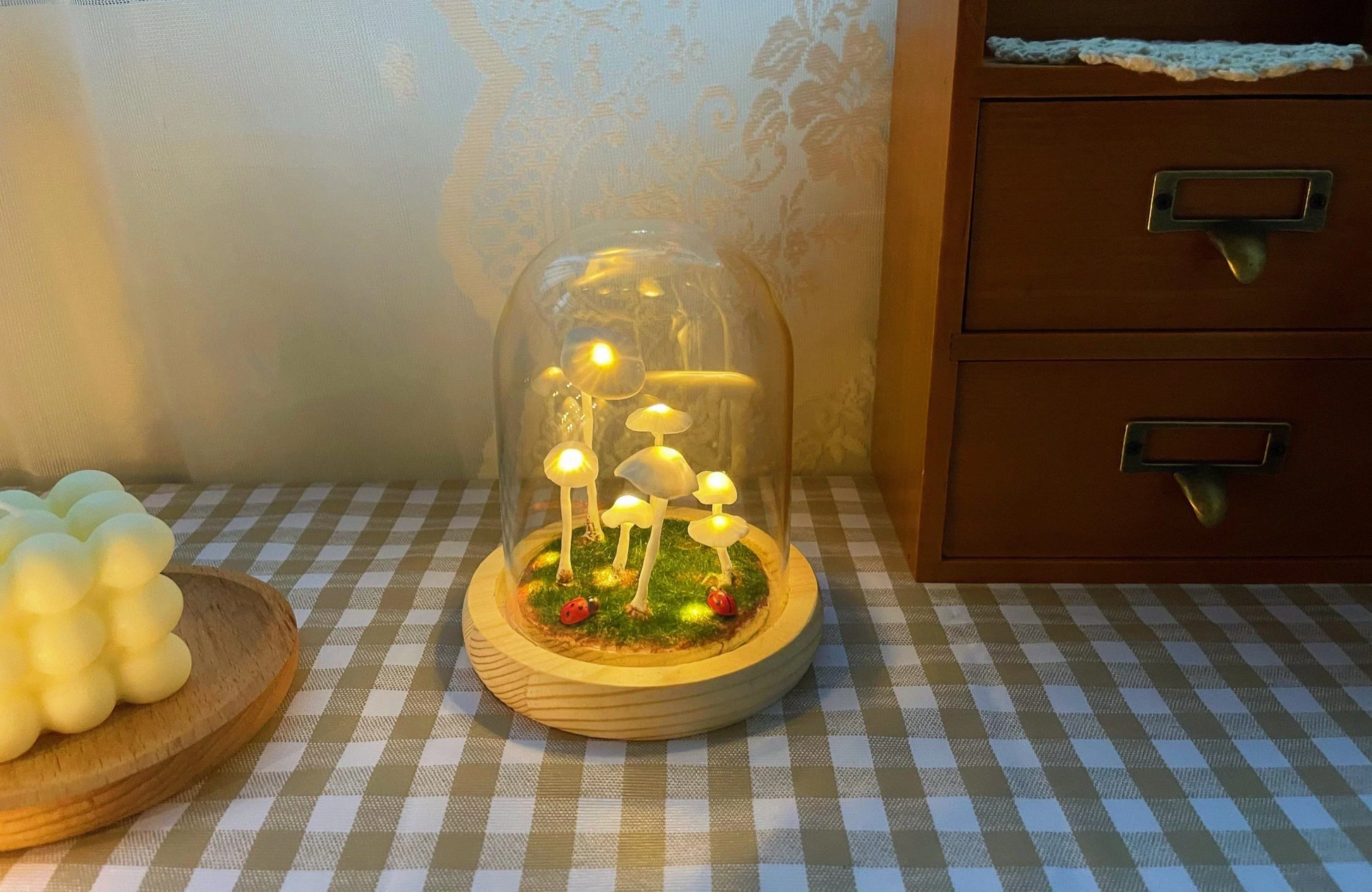 Fitlybuy Enchanted Mushroom DIY glass lamp featuring glowing white fungi, moss, and ladybugs on a wooden base.