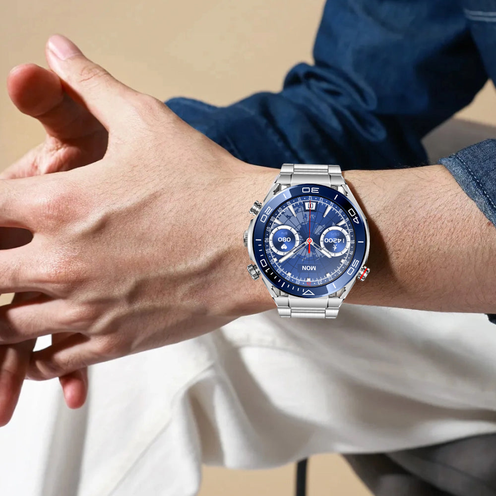Fitlybuy Kexi-Life Max 1 smartwatch with blue dial and silver metal band worn on a person's wrist.
