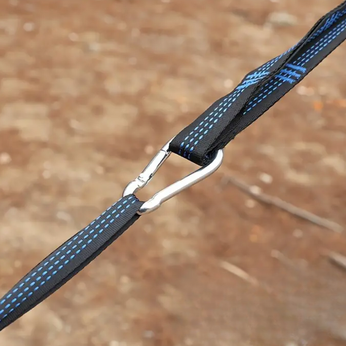 Fitlybuy hammock strap secured with a silver metal carabiner, featuring durable black webbing with blue stitching.