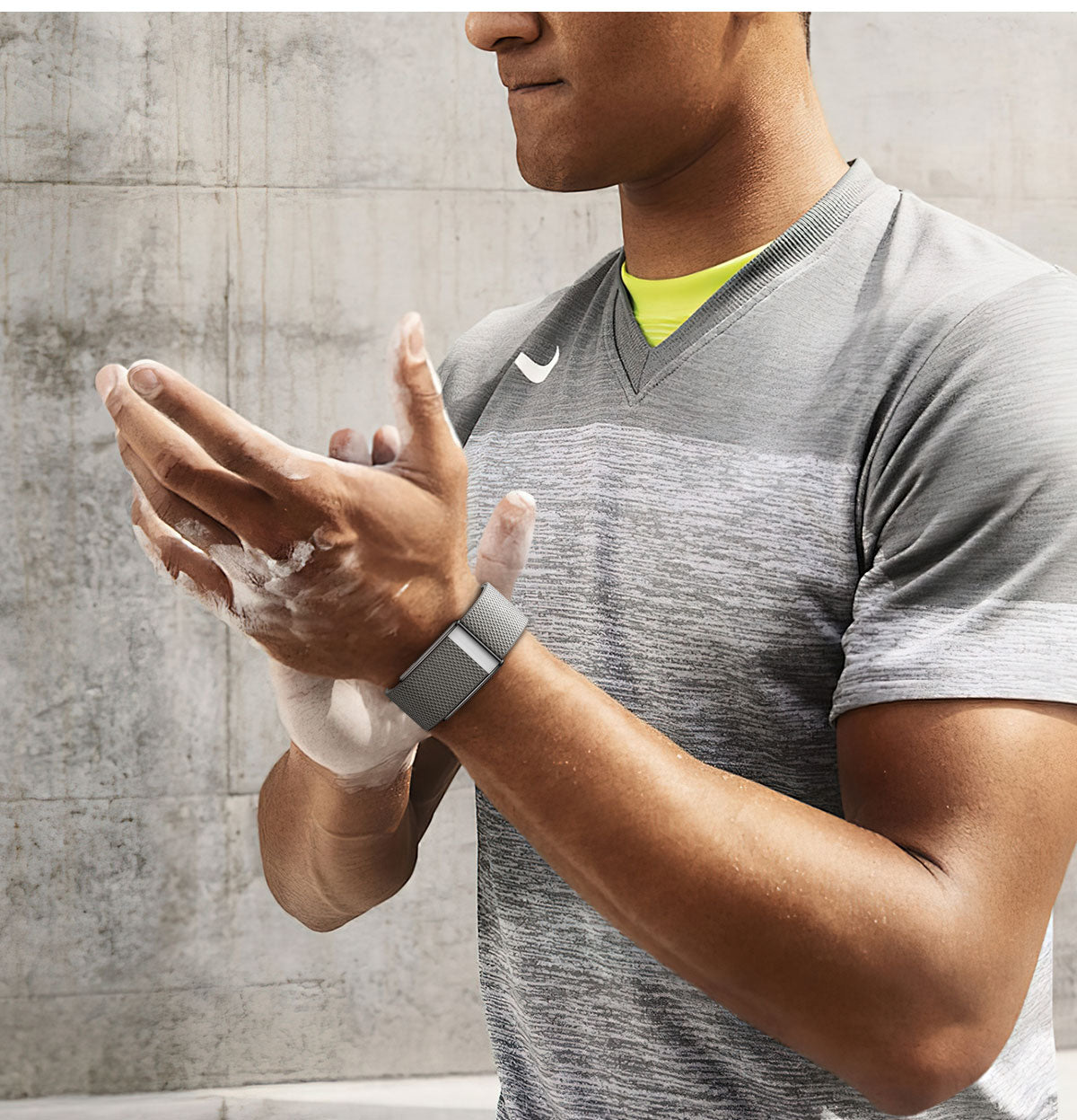 Fitlybuy Kexi-Life health monitor: A sleek gray smart bracelet on an athlete applying chalk to hands.