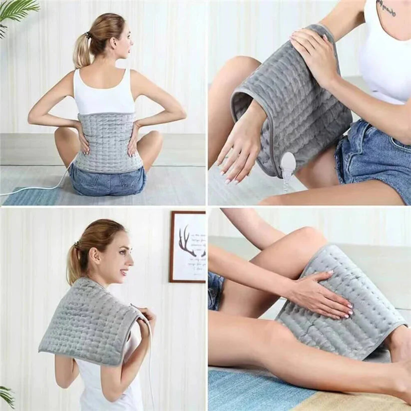 Grey, soft-textured Fitlybuy electric heating pad used on the back, arm, shoulder, and legs for pain relief.