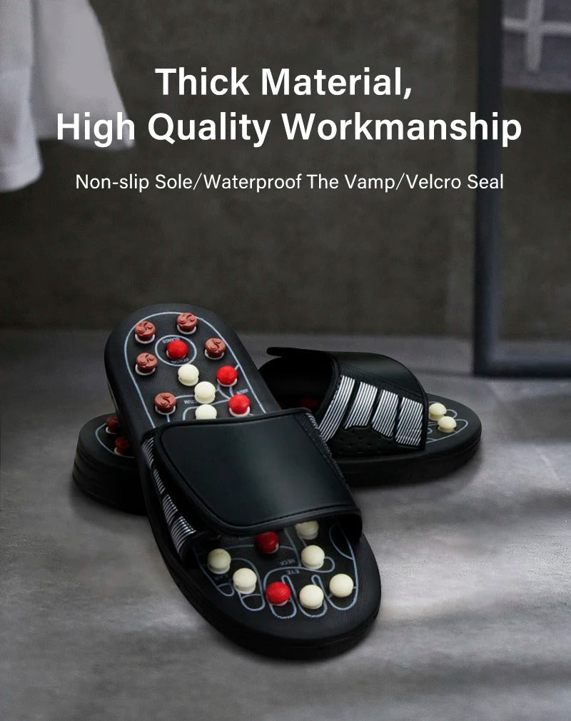 Black Fitlybuy reflexology slippers with red and white massage nodes, adjustable velcro strap, and non-slip sole.