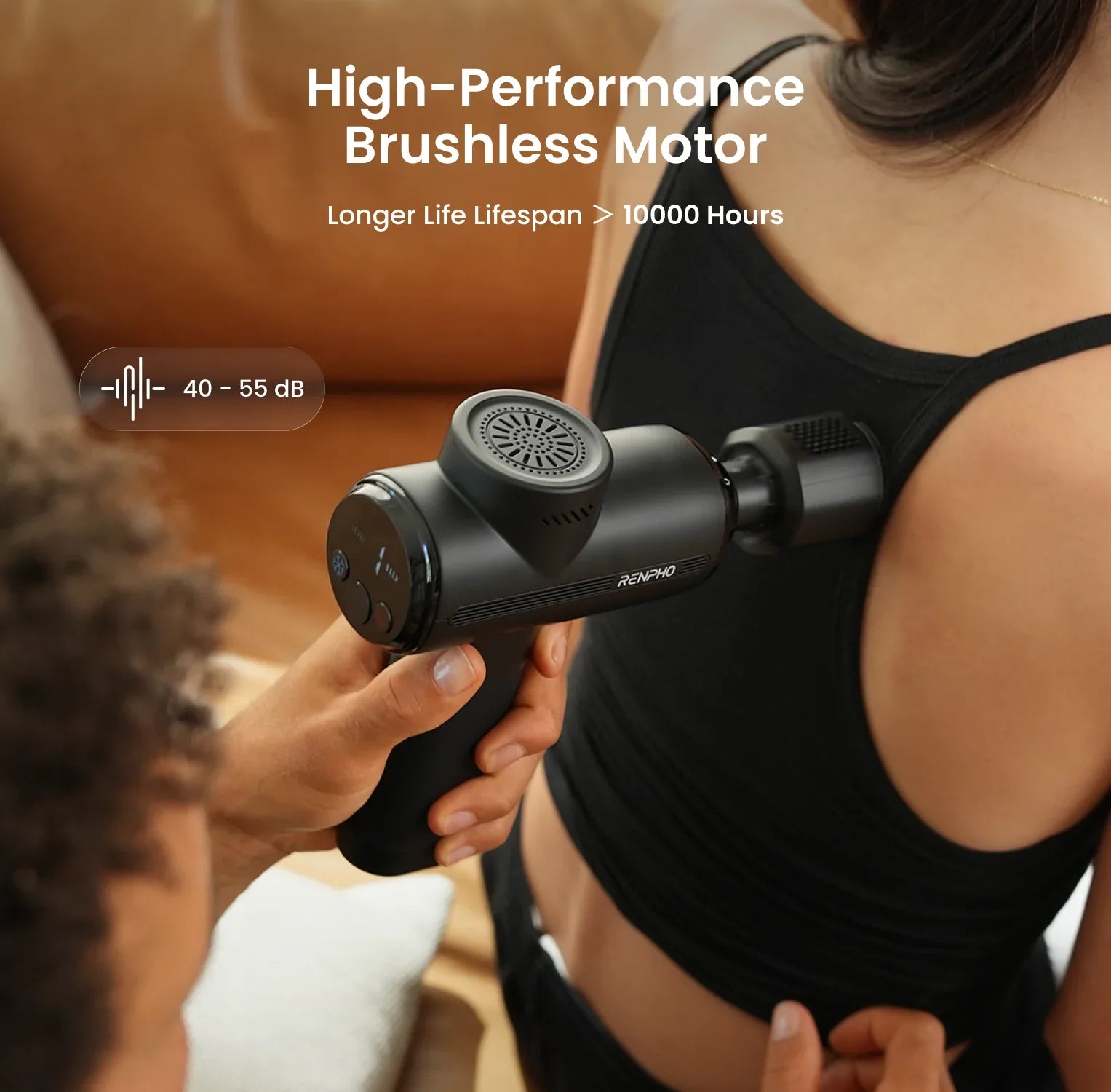 Black Fitlybuy Thermacool massage gun used on a person's back, featuring advanced heat therapy and quiet motor.