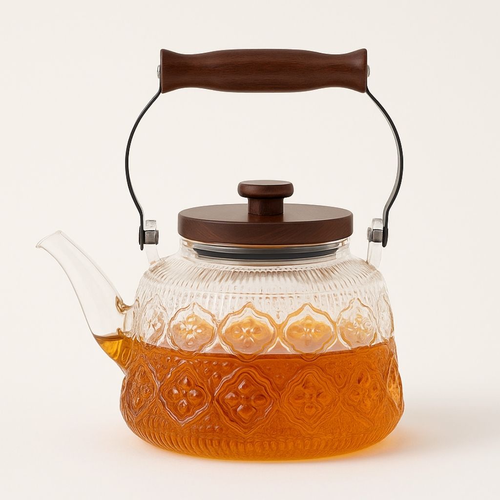 Fitlybuy Zoie glass teapot with embossed patterns, brown wooden lid, and handle, filled with amber tea on white background.
