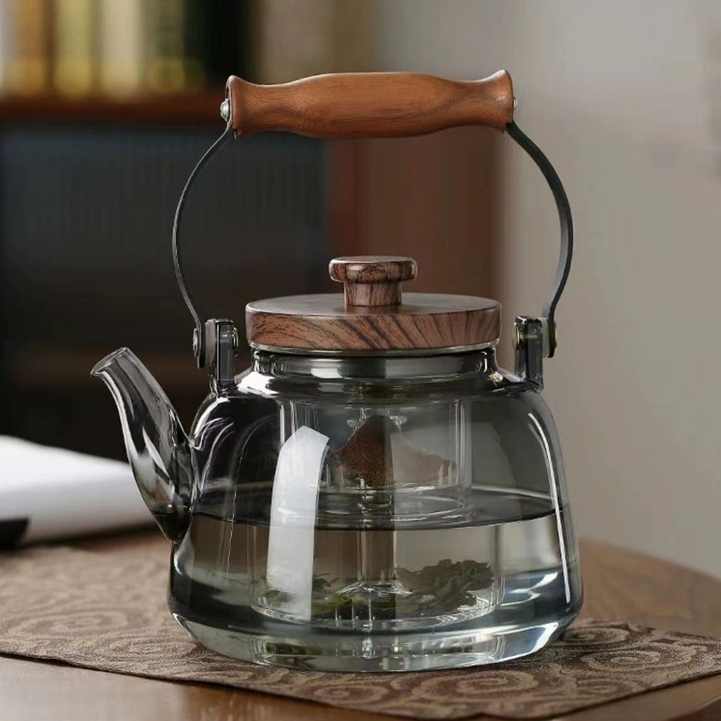 Fitlybuy Zoie glass teapot with infuser, 1000ml, featuring a heat-resistant borosilicate design and wooden handle.