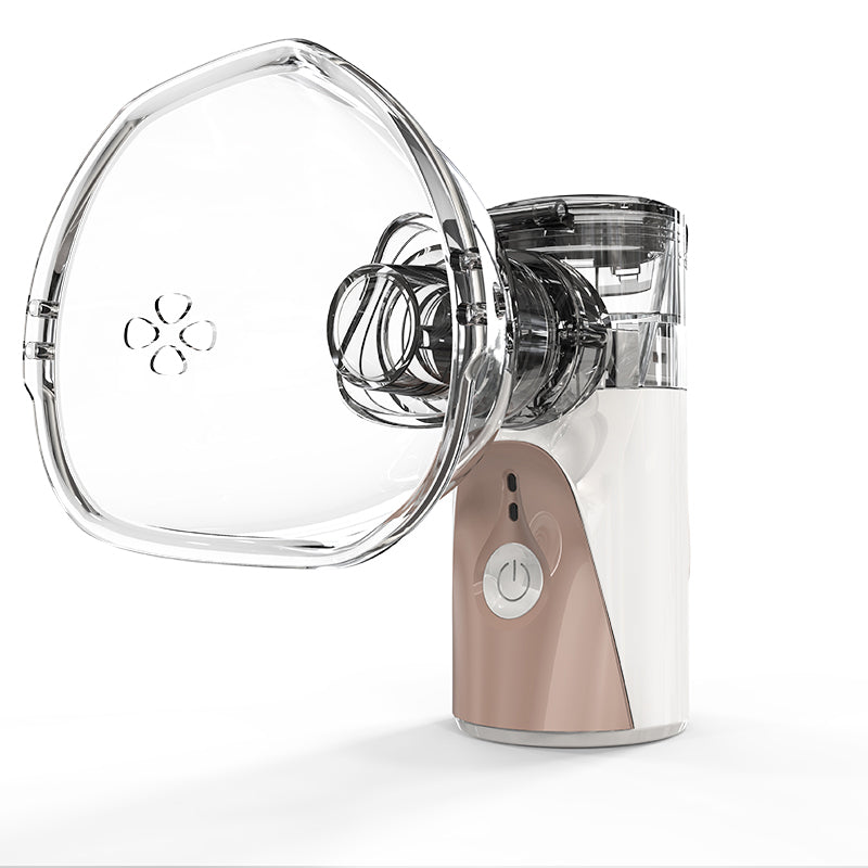 Fitlybuy portable handheld nebulizer in white and rose gold with a transparent mask, isolated on a white background.