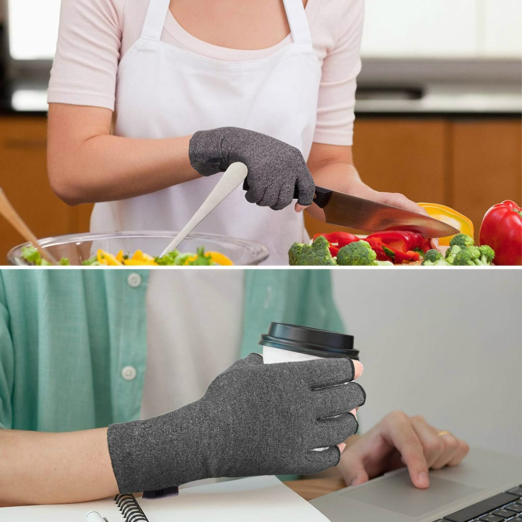 Person wearing grey, fingerless Fitlybuy compression arthritis gloves while cooking and using a laptop.