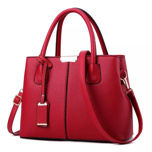 Red Fitlybuy Emily PU leather handbag with gold accents, top handles, and an adjustable crossbody strap.