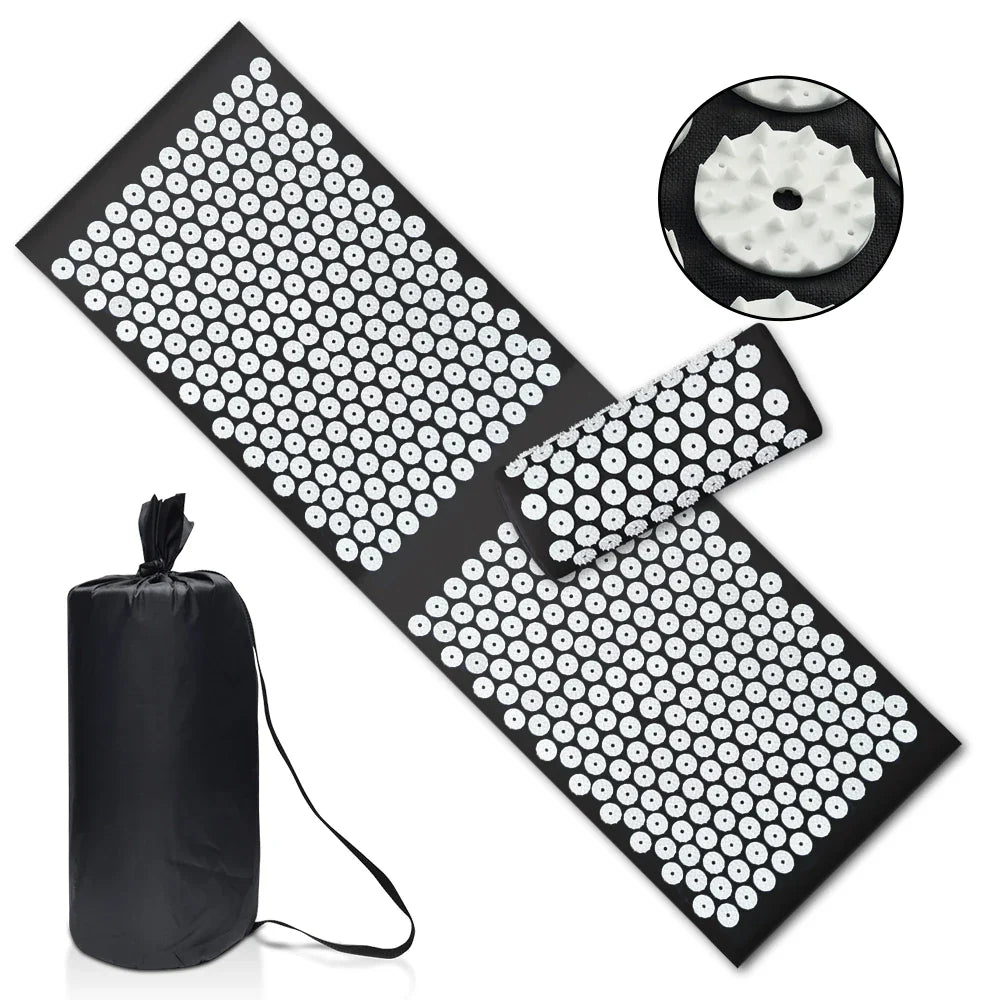 Fitlybuy black acupressure yoga mat and pillow set with white ergonomic pressure point discs and a carry bag.