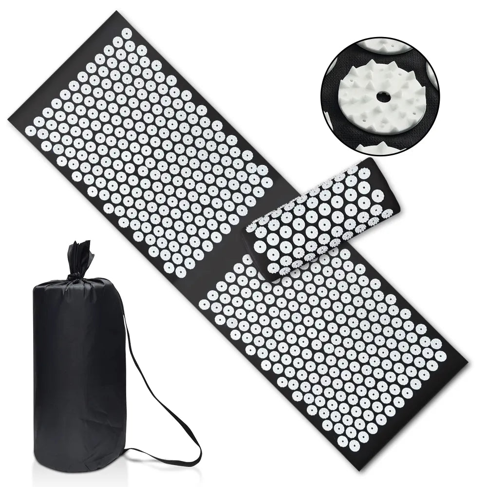Fitlybuy black acupressure yoga mat and pillow set with white ergonomic pressure point discs and a carry bag.