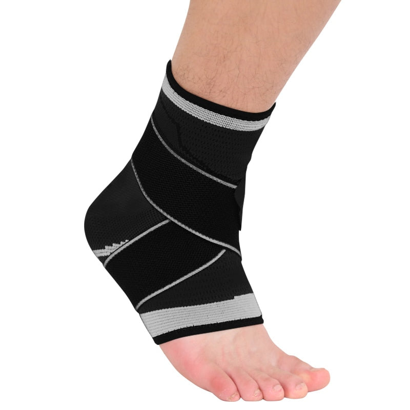 Fitlybuy black and gray compression ankle brace worn on a person's foot, showing adjustable stabilizing straps.