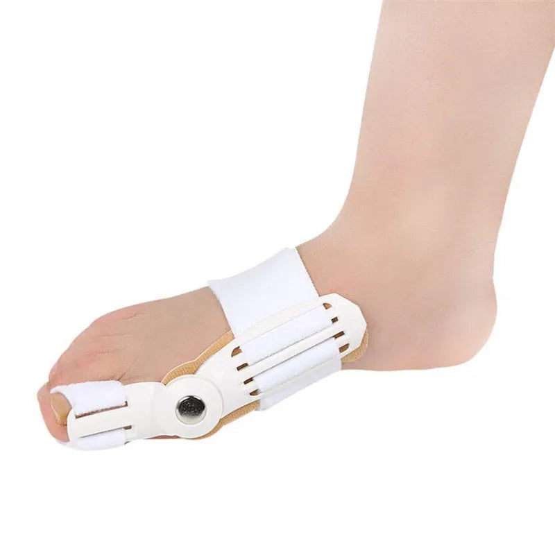 White Fitlybuy orthopaedic big toe corrector with ComfortAlign hinge worn on a foot to treat bunions.