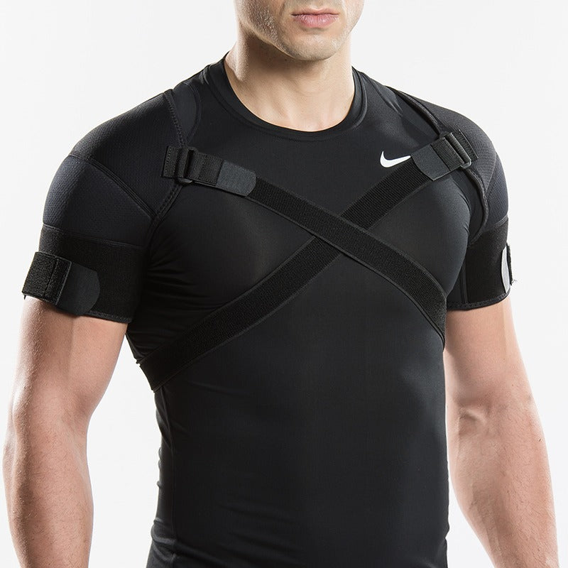 Fitlybuy black dual shoulder compression wrap with adjustable cross-straps on an athletic man.