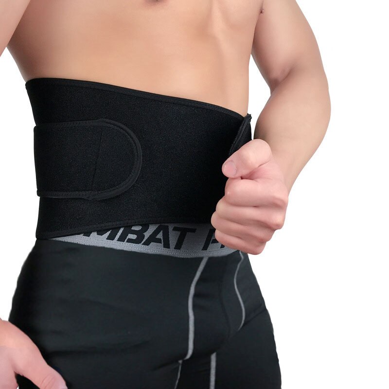 Fitlybuy black lumbar support belt with adjustable ComfortFlex strap, worn around the waist over black compression shorts.