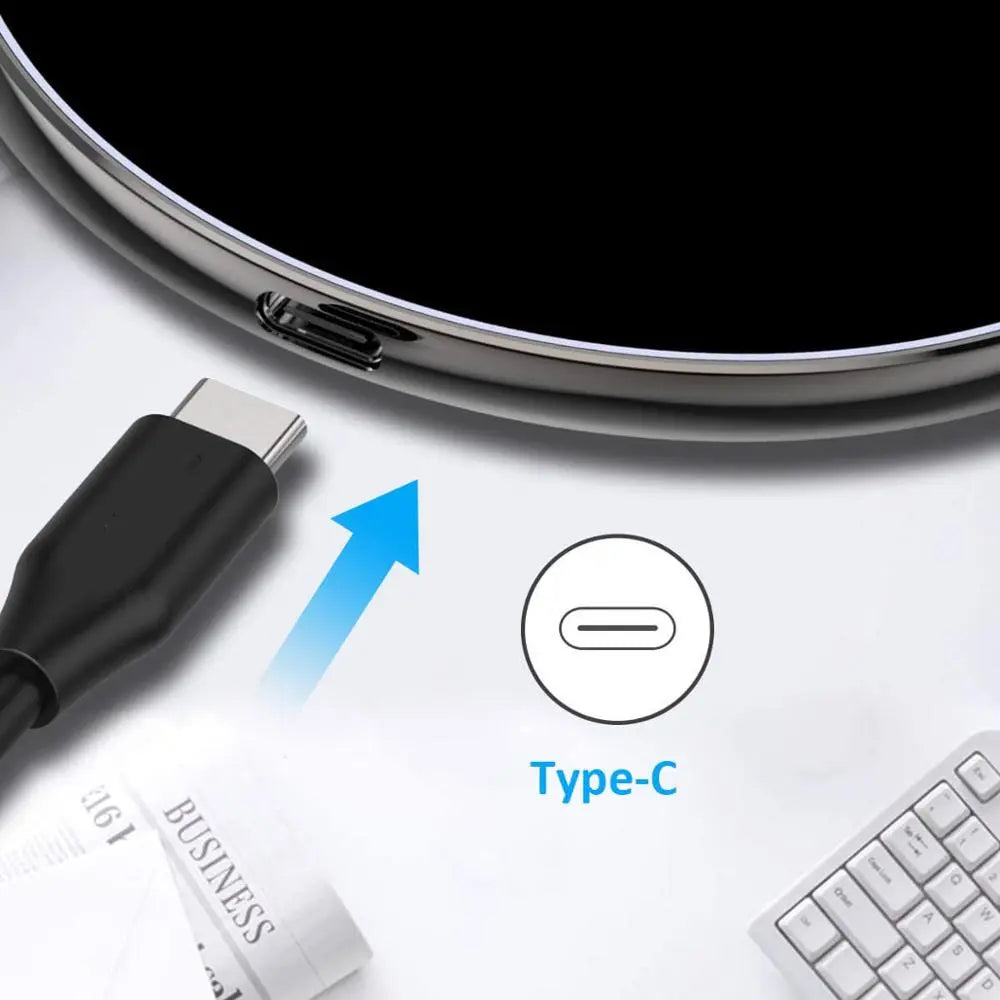Fitlybuy 30W wireless charging pad with USB-C cable and port, showing MagSafe-style design on a desk.