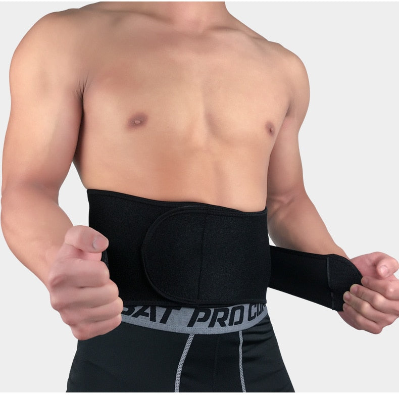 Shirtless man wearing a black Fitlybuy adjustable lumbar support belt with ComfortFlex technology over athletic shorts.