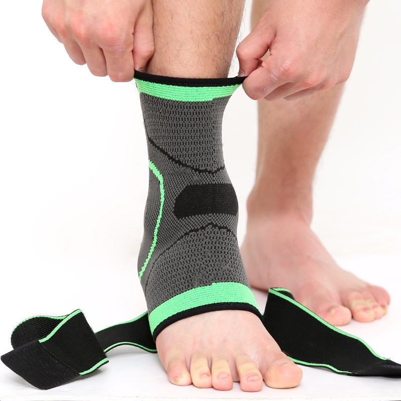 A person wearing a grey and lime green Fitlybuy compression ankle brace with stabilizing straps on a white background.