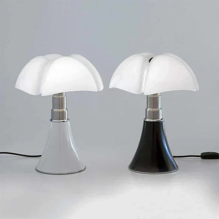 Two Fitlybuy FloraLuxe floral-shaped lamps with white glass shades, one on a white base, one on a black base.