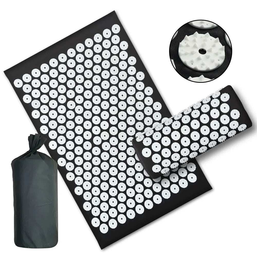 Black Fitlybuy acupressure yoga mat and pillow set with white ergonomic spike discs and a matching carry bag.