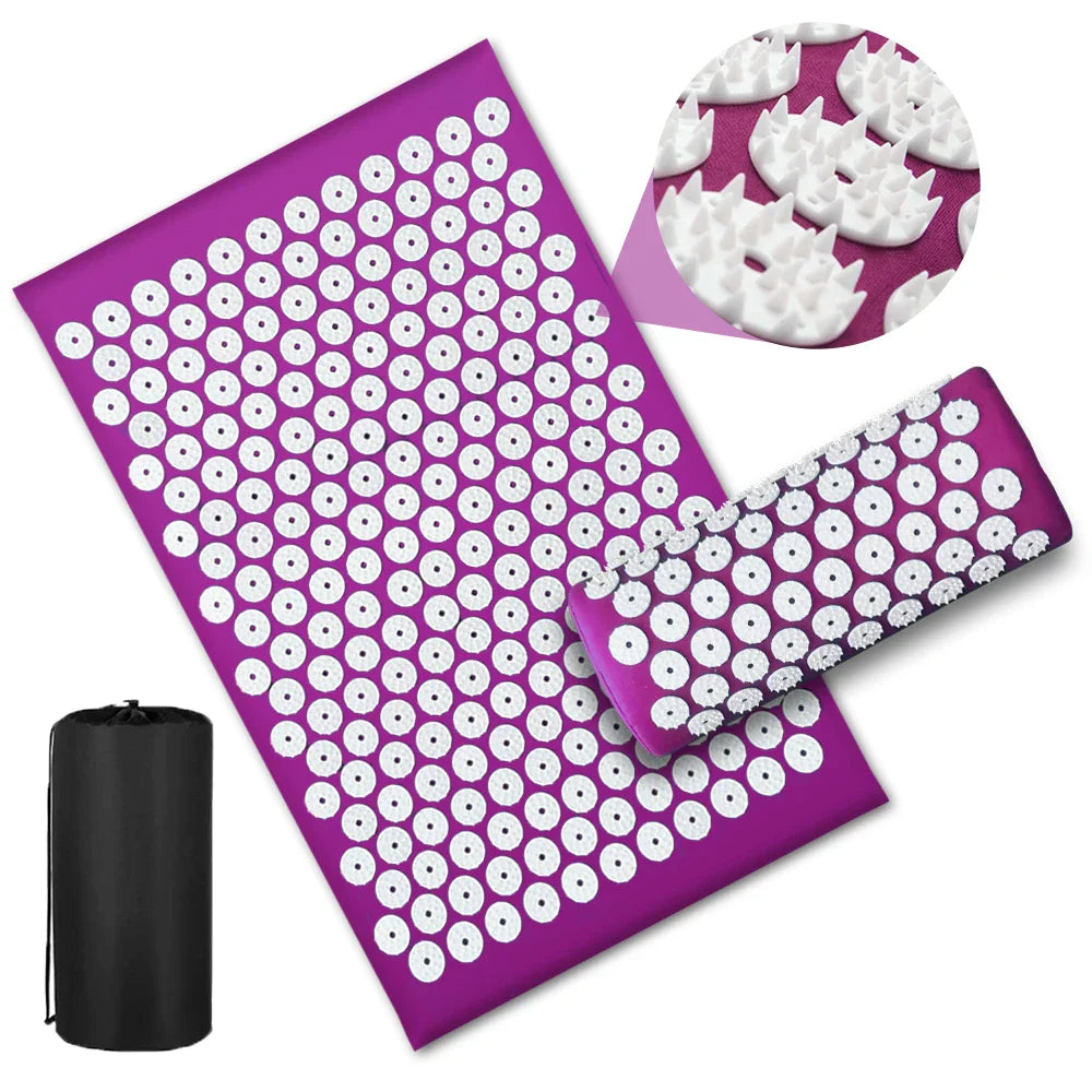 Purple Fitlybuy acupressure yoga mat with white spike discs, including a matching pillow and a black storage bag.