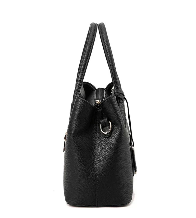 Side view of a black Fitlybuy Emily pebbled PU leather handbag with dual handles and gold-tone hardware.