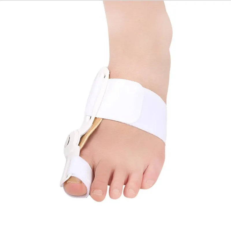 Fitlybuy white orthopaedic big toe corrector with adjustable strap and ComfortAlign hinge worn on a bare foot.
