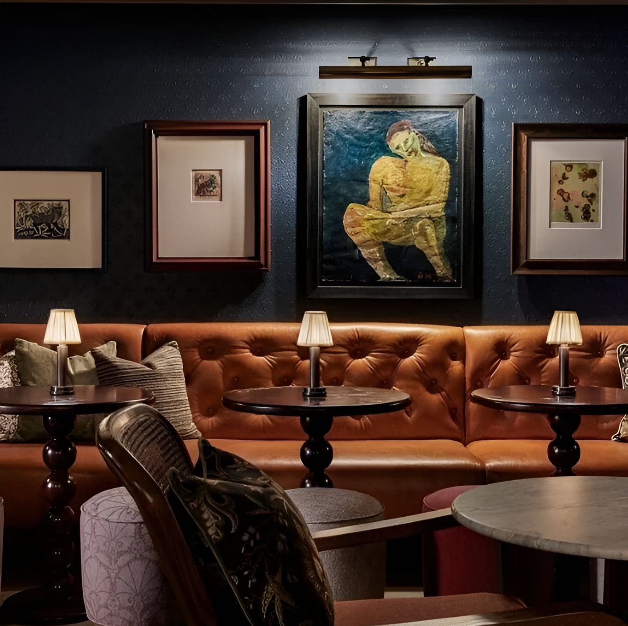 Fitlybuy vintage dimmable LED table lamps with pleated fabric shades on small dark wood tables against a leather sofa.