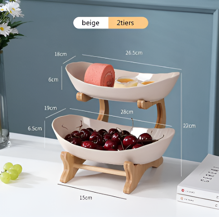 Fitlybuy beige 2-tier wooden fruit bowl on a white table, holding cherries and snacks, with detailed dimension labels.